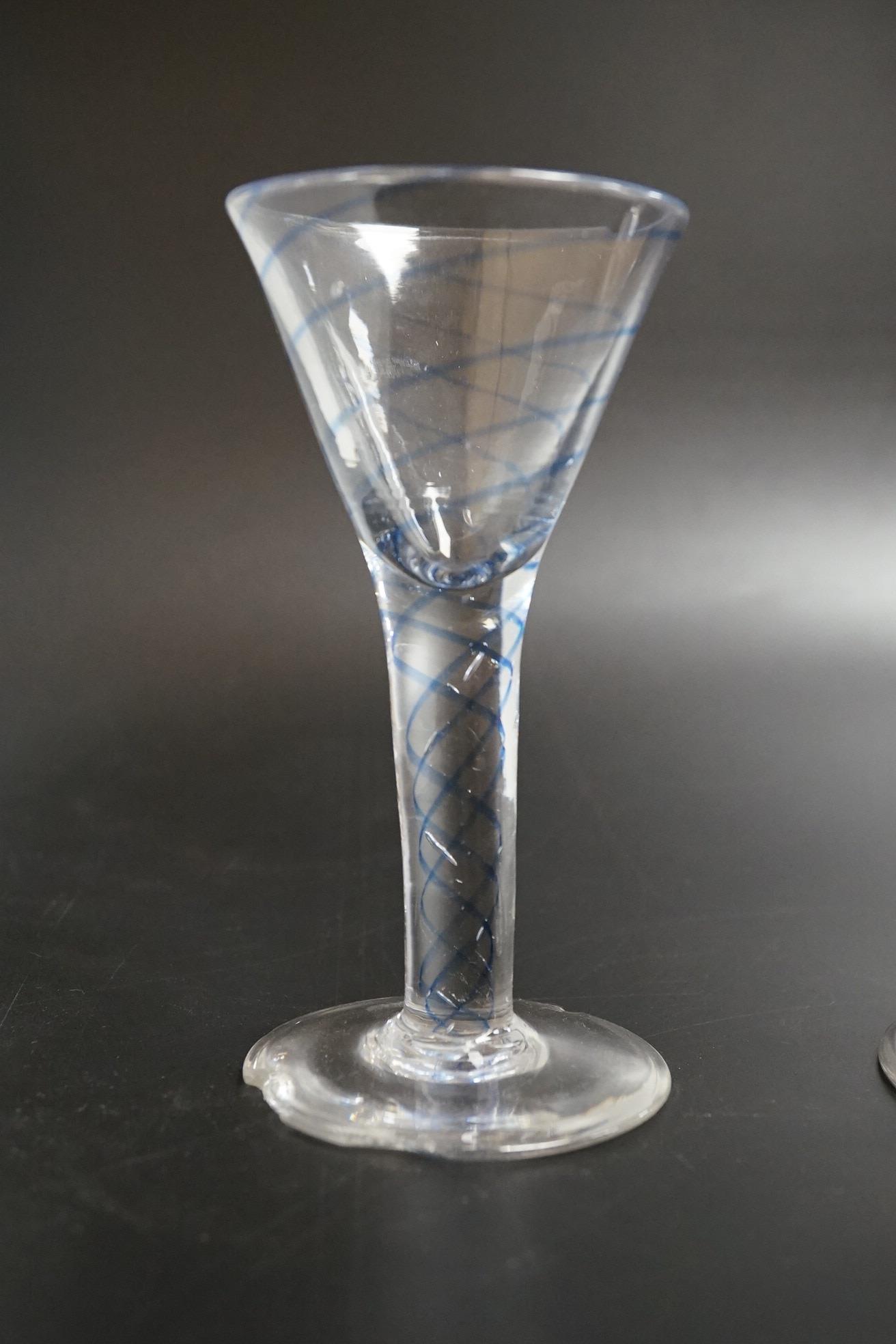 Two drawn wine glasses, each with air-tear stems, and a drawn-stem wine glass with blue internal twist, tallest 17cm high (3)